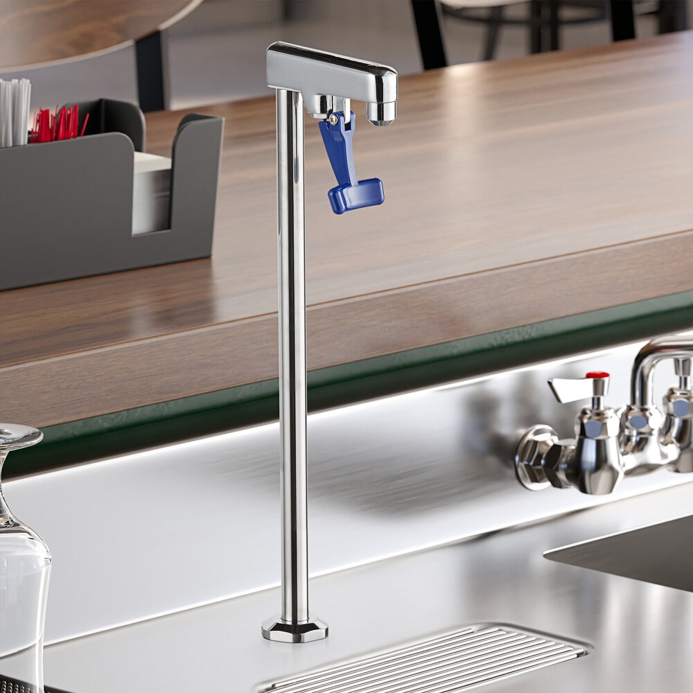 A silver metal and blue plastic Waterloo countertop glass filler.