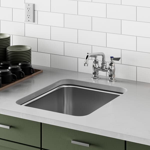 A close-up of a Waterloo stainless steel undermount sink.
