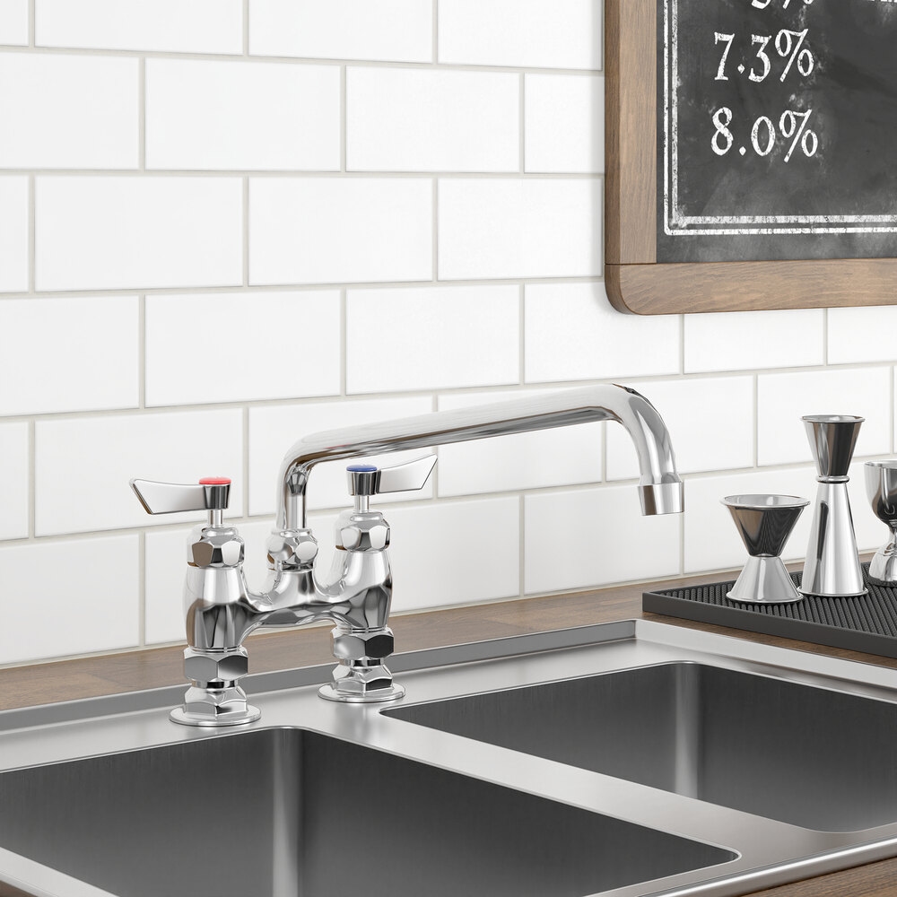 A Waterloo deck-mounted faucet with silver and red knobs.