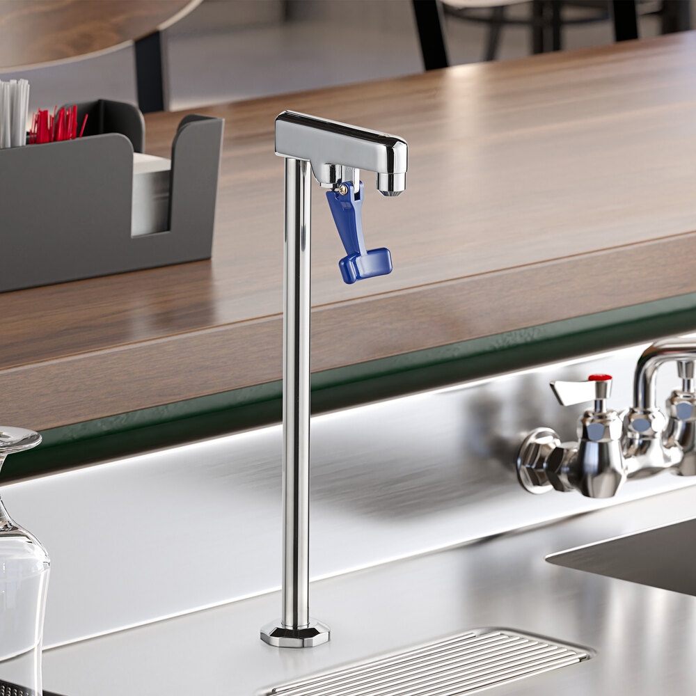 A Waterloo countertop glass filler with a blue and silver faucet handle.