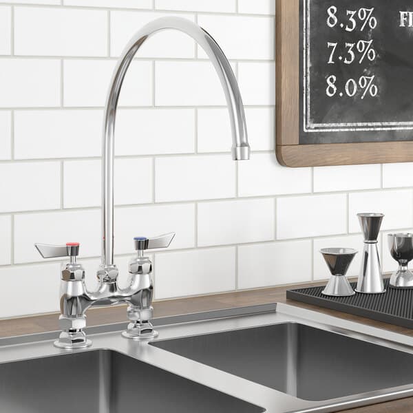 A Waterloo deck-mount faucet with 12" gooseneck spout and 4" centers over a sink with a chalkboard above it.