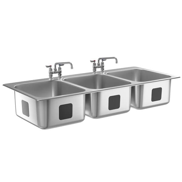 A stainless steel Waterloo drop-in sink with three bowls and a faucet.