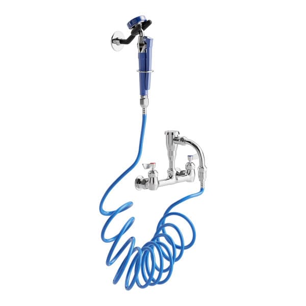 A Waterloo pet grooming faucet with a blue hose attached.