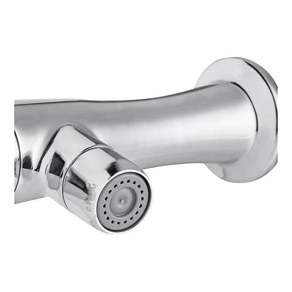 A silver Waterloo wall-mount metering faucet with nozzle.
